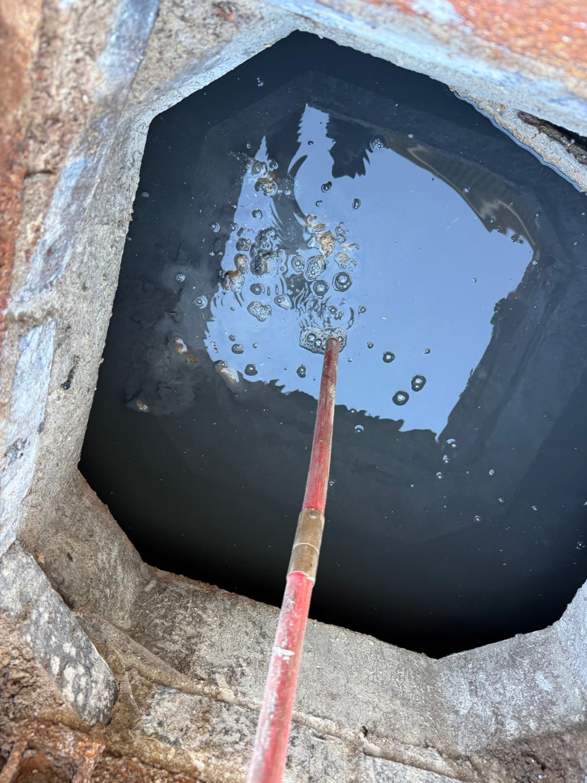 Overflowing drain inspection chamber Blackpool - blocked drain in garden